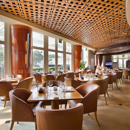 The Fullerton Hotel Σιγκαπούρη Εξωτερικό φωτογραφία The interior of the restaurant
