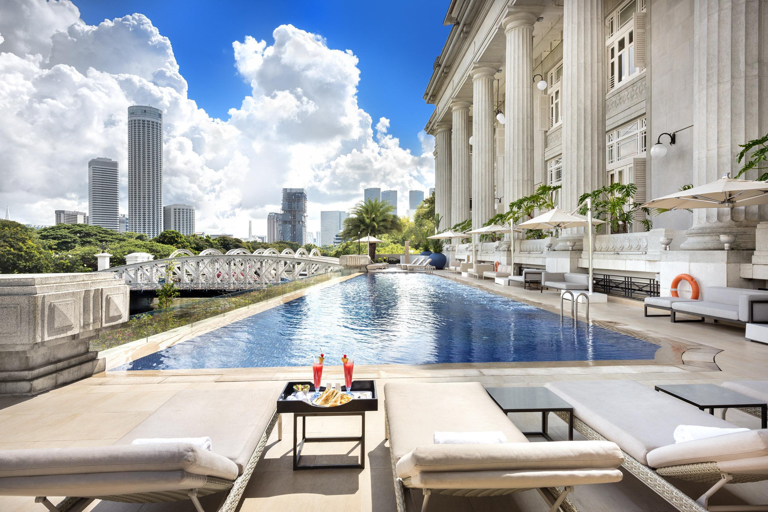 The Fullerton Hotel Σιγκαπούρη Εξωτερικό φωτογραφία The pool at the Raffles Hotel Le Royal