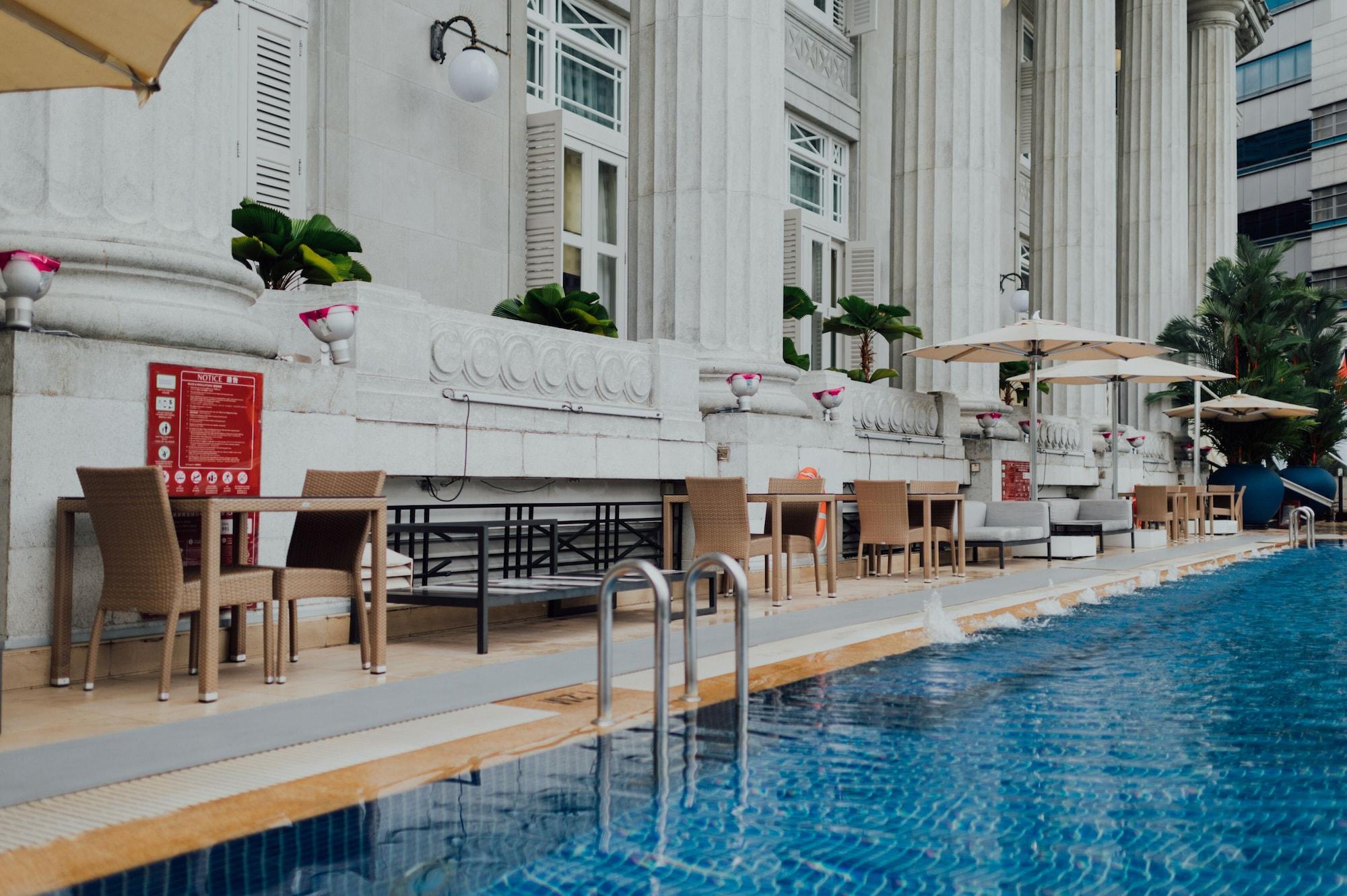 The Fullerton Hotel Σιγκαπούρη Εξωτερικό φωτογραφία The pool at the hotel